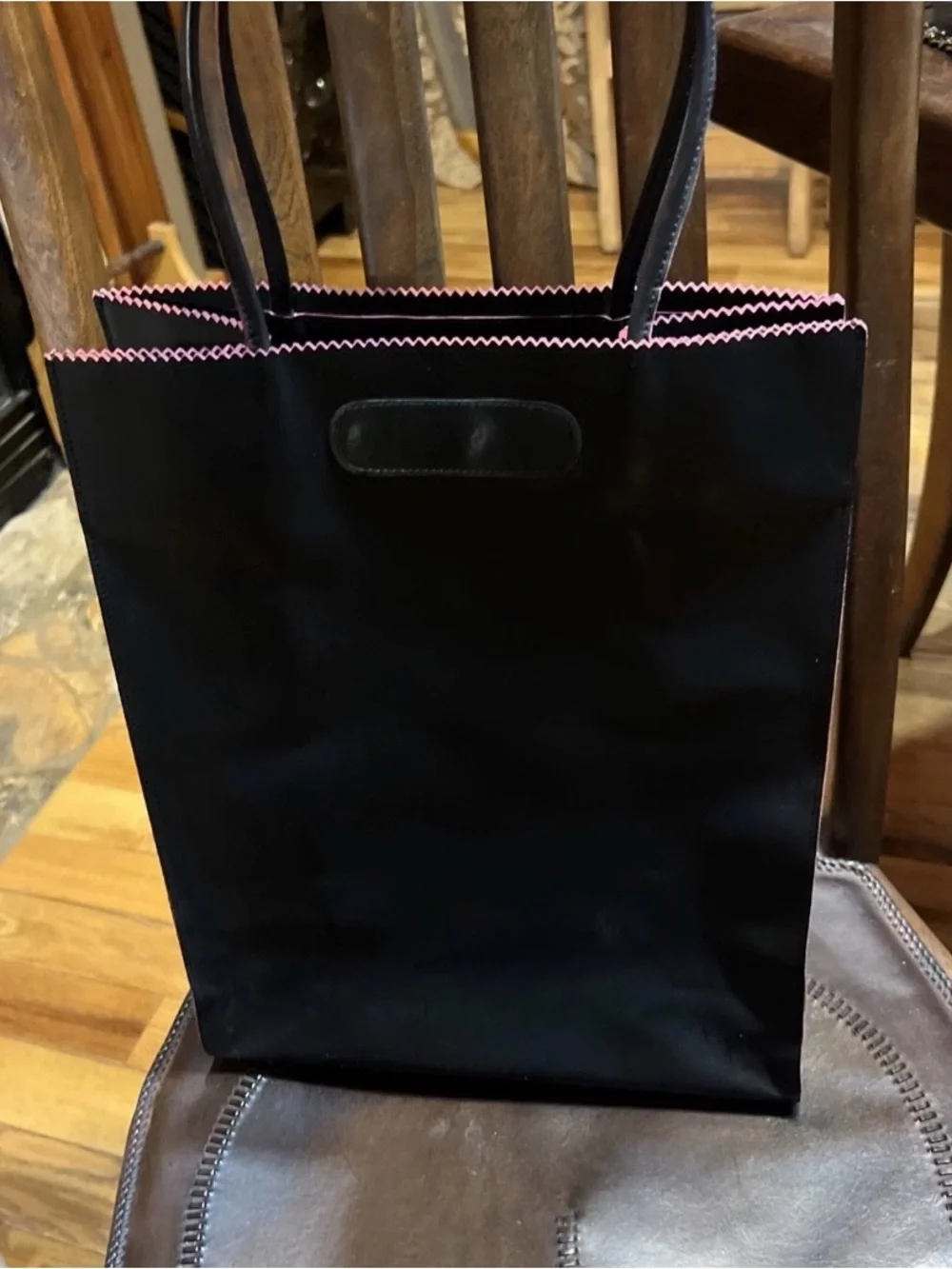CHANEL Black Leather Tote Bag with Pink Trim